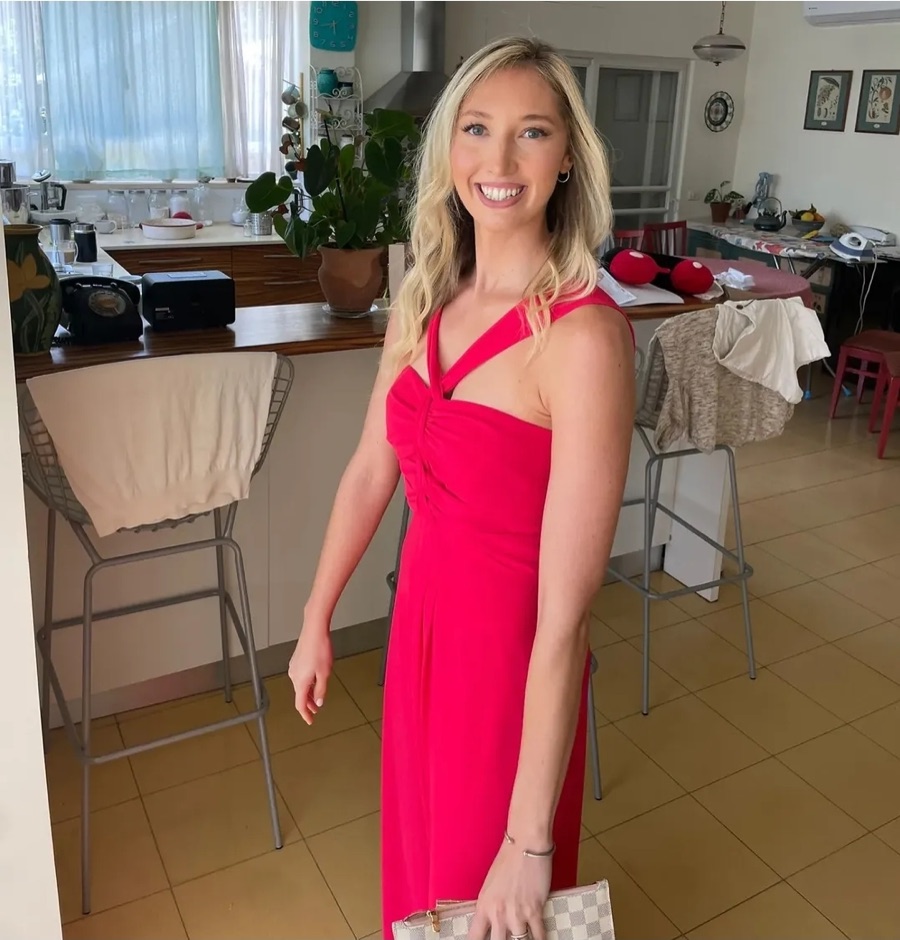 Red dress with an asymmetric neckline